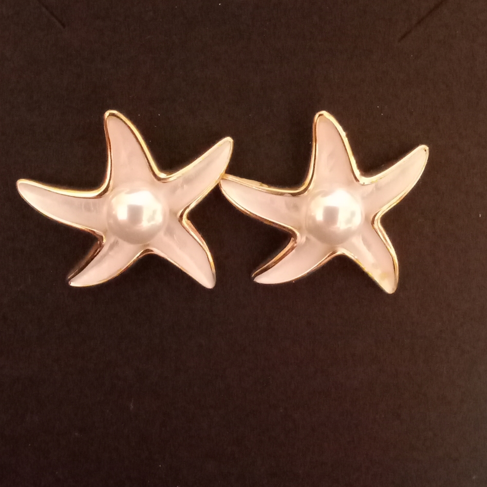 14 k Yellow Gold Plated Star Earrings.